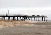 The Crest Pier stretches over the beach in Wildwood Crest, N.J. on Thursday, March 13, 2025.