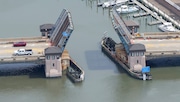 An aerial photo dating from April 2024 of the Route 71 drawbridge between Avon and Belmar shows it is left in the open position after it malfunctioned in early March. Summer is the time when drawbridges get the most use and tend to breakdown from the stress of too much traffic, an engineer said.