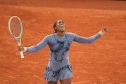 Coco Gauff of the U.S. celebrates as she won the quarterfinal match of the French Tennis Open against Madison Keys of the U.S. at the Roland-Garros stadium in Paris, Wednesday, June 4, 2025. (AP Photo/Christophe Ena)