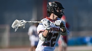Luke Tortorici (22) of Barnegat moves the ball against Ocean Township during the boys lacrosse game at Ocean Township High School in Oakhurst, NJ on Monday. April 28, 2025