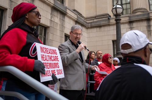 State workers protest double-digit insurance premium hikes