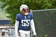 Linebacker Josh Uche arrives for practice at Patriots training camp at Gillette Stadium in Foxborough, Massachusetts.