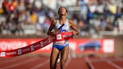 Paige Sheppard of Union Catholic reacts as she crosses the finish line to win the High School Girls' Distance Medley Championship of America at the Penn Relays, Friday, April 25, 2025 in Philadelphia.
