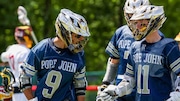 Mikey Ramirez (9) of Pope John celebrates with Hunter Parrillo (11) after scoring a goal against Voorhees during the boys lacrosse Hunterdon/Warren/Sussex Tournament Final at Lenape Valley Regional High School in Stanhope, NJ on Saturday, May 10, 2025.