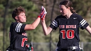 Jorja Krowicki (17) of Hunterdon Central celebrates with Katie Gray (10) after intercepting the ball to end the game against Watchung Hills during the flag football game at Hunterdon Central High School in Flemmington, NJ on Wednesday, April 30, 2025.