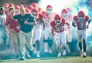 Rutgers coach Greg Schiano leads the Scarlet Knights out of the tunnel to play UCLA, Saturday, Oct. 19, 2024 in Piscataway, N.J.