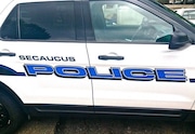 Secaucus police arrested a teenager on Christmas Eve in Secaucus who was in possession of a stolen car, marijuana and a handgun.