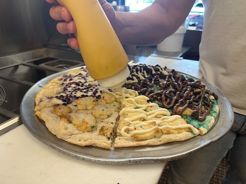 The assembly of a large dessert pie at Brother Bruno's Pizza in Wayne, NJ