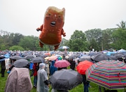 Donald Trump ballon in the crowd as Montclair Dems, BluewaveNJ and other local grassroots groups gather as a community to say No Kings, in Montclair, NJ on Saturday, June 14, 2025