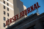 The Jersey Journal sign on top of the newspaper's former building at 30 Journal Square in Jersey City on Nov. 12, 2024. (Reena Rose Sibayan | The Jersey Journal)